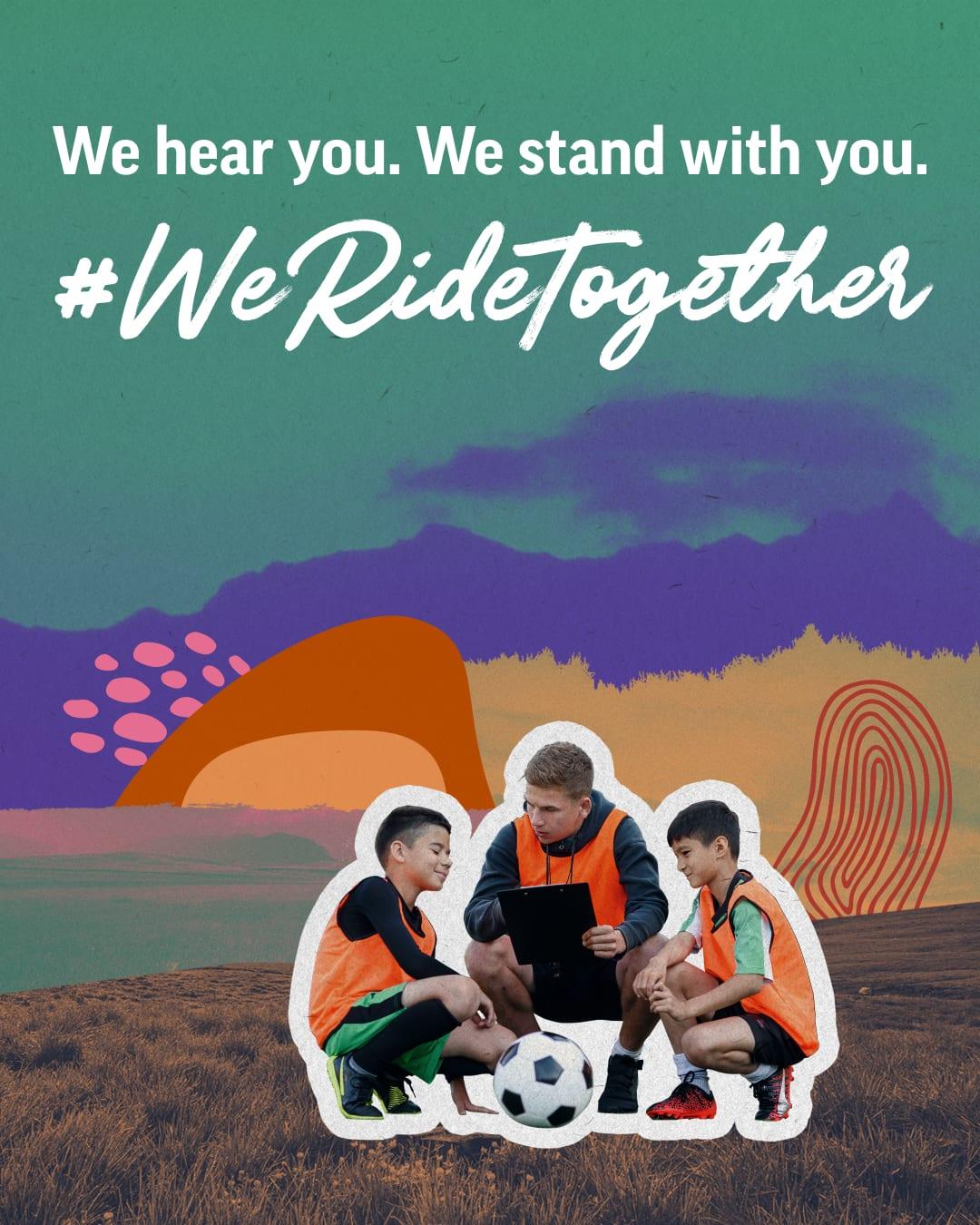 "We hear you. We stand with you. #WeRideTogether" poster with a coach and young soccer players kneeling around a ball