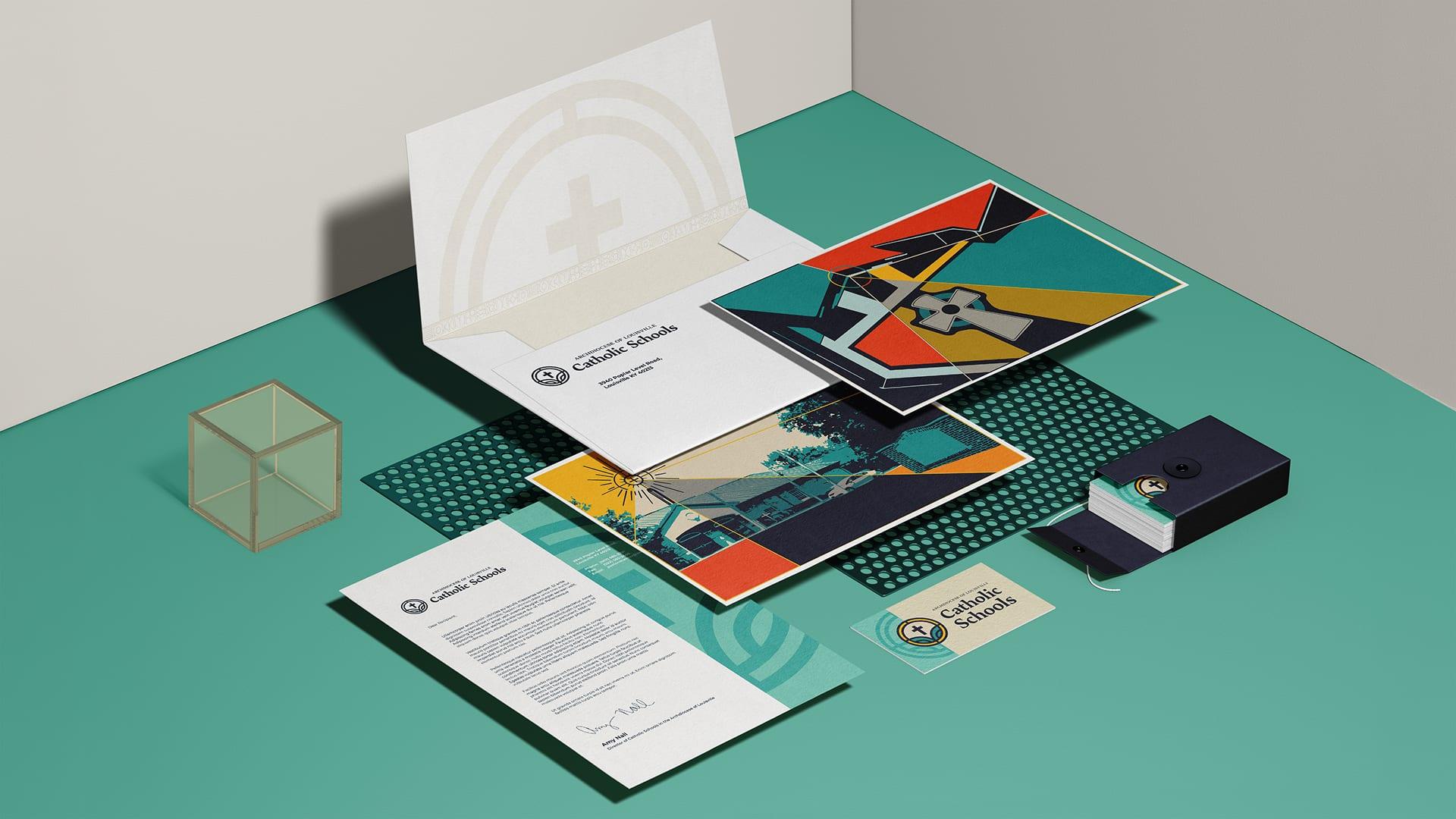 Brand stationery set with letterhead, folder, envelope, postcards and business cards on a teal surface