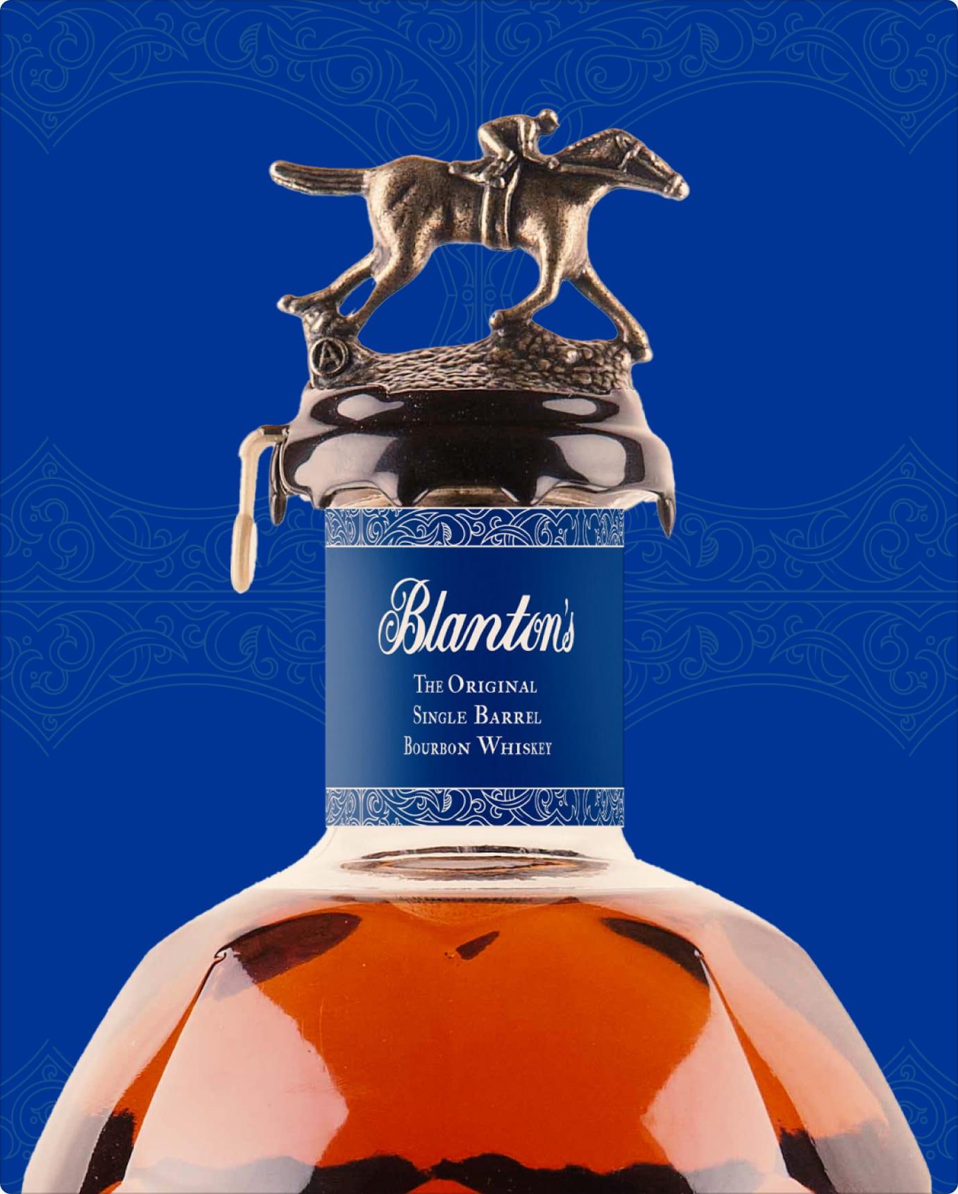 Bronze racehorse stopper and blue neck label reading The Original Single Barrel Bourbon Whiskey, against an ornamental blue background