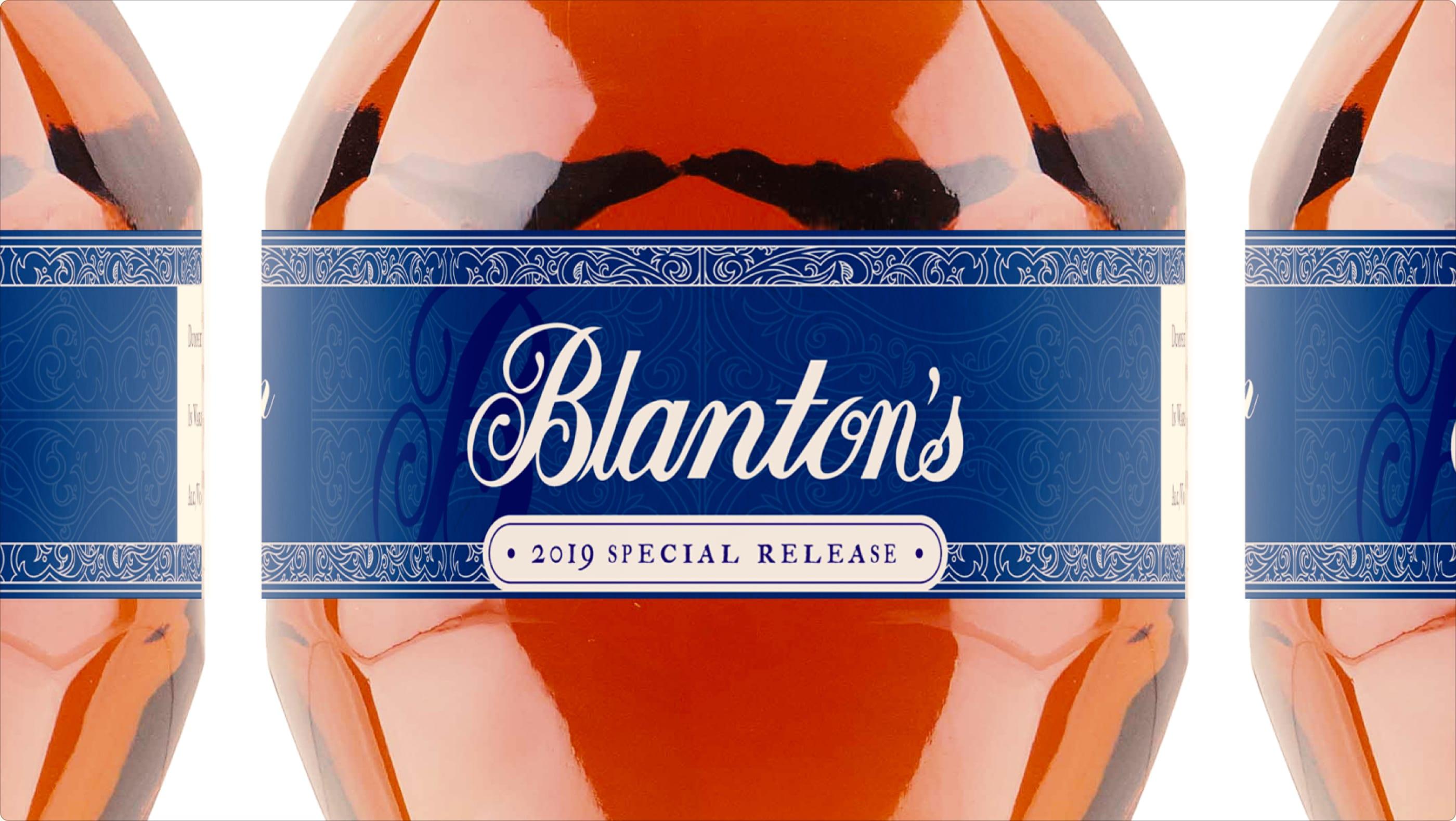Three bottles side by side showing the blue 2019 Special Release label with ornamental borders