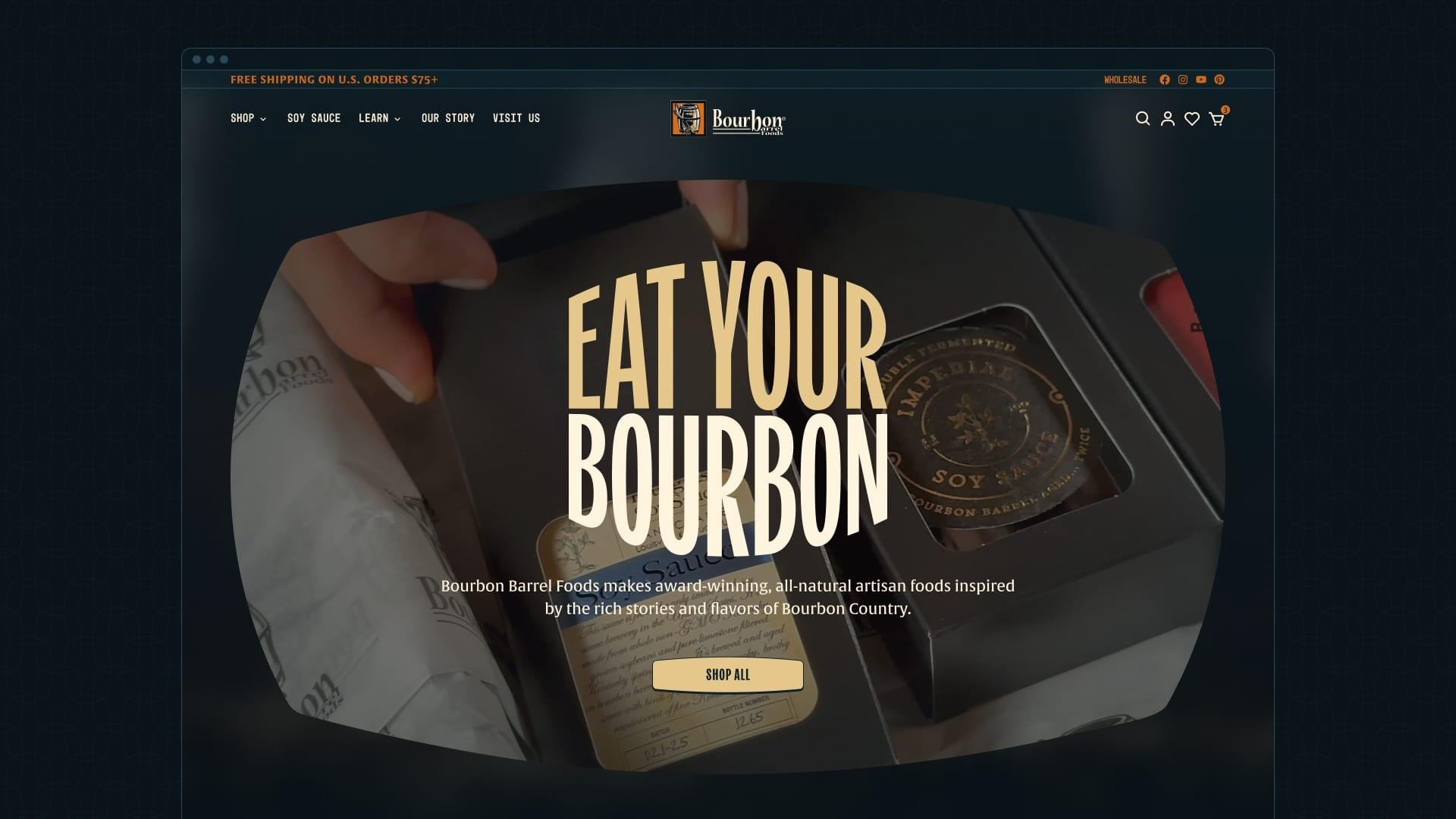 The Bourbon Barrel Foods website homepage with the headline "Eat Your Bourbon" over a gift box