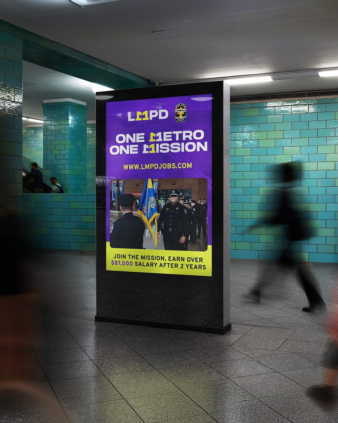 One Metro One Mission digital poster in a subway station promoting the salary after two years